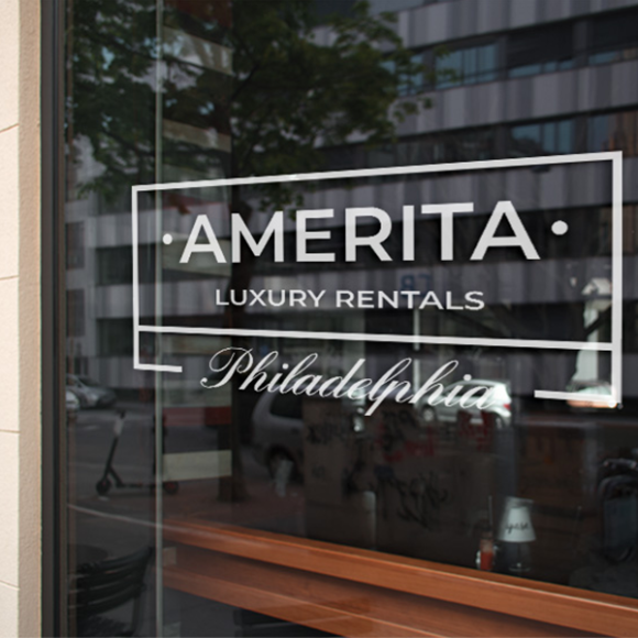 a window with a sign that says amerita luxury rentals.