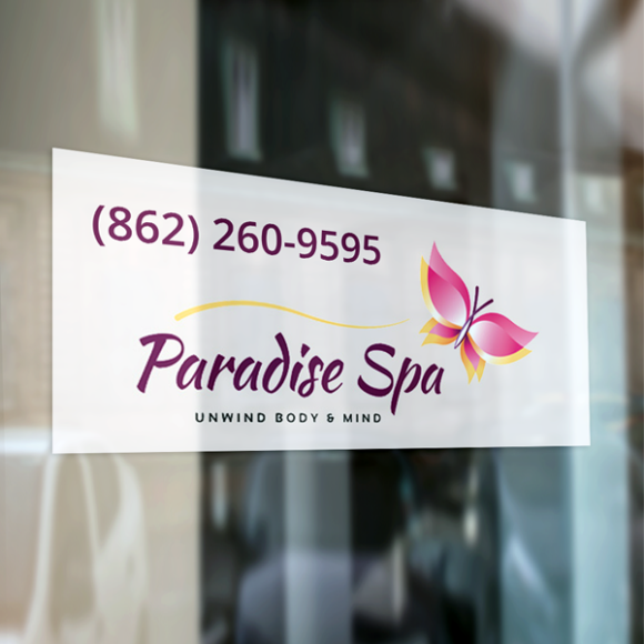 a sign on a glass door that says paradise spa.