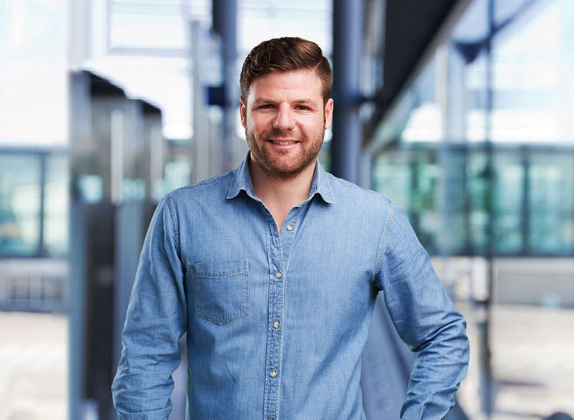Confident smiling remote compute repair technician