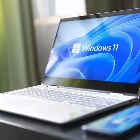Windows 11 Laptop & Tablet on a Computer Desk