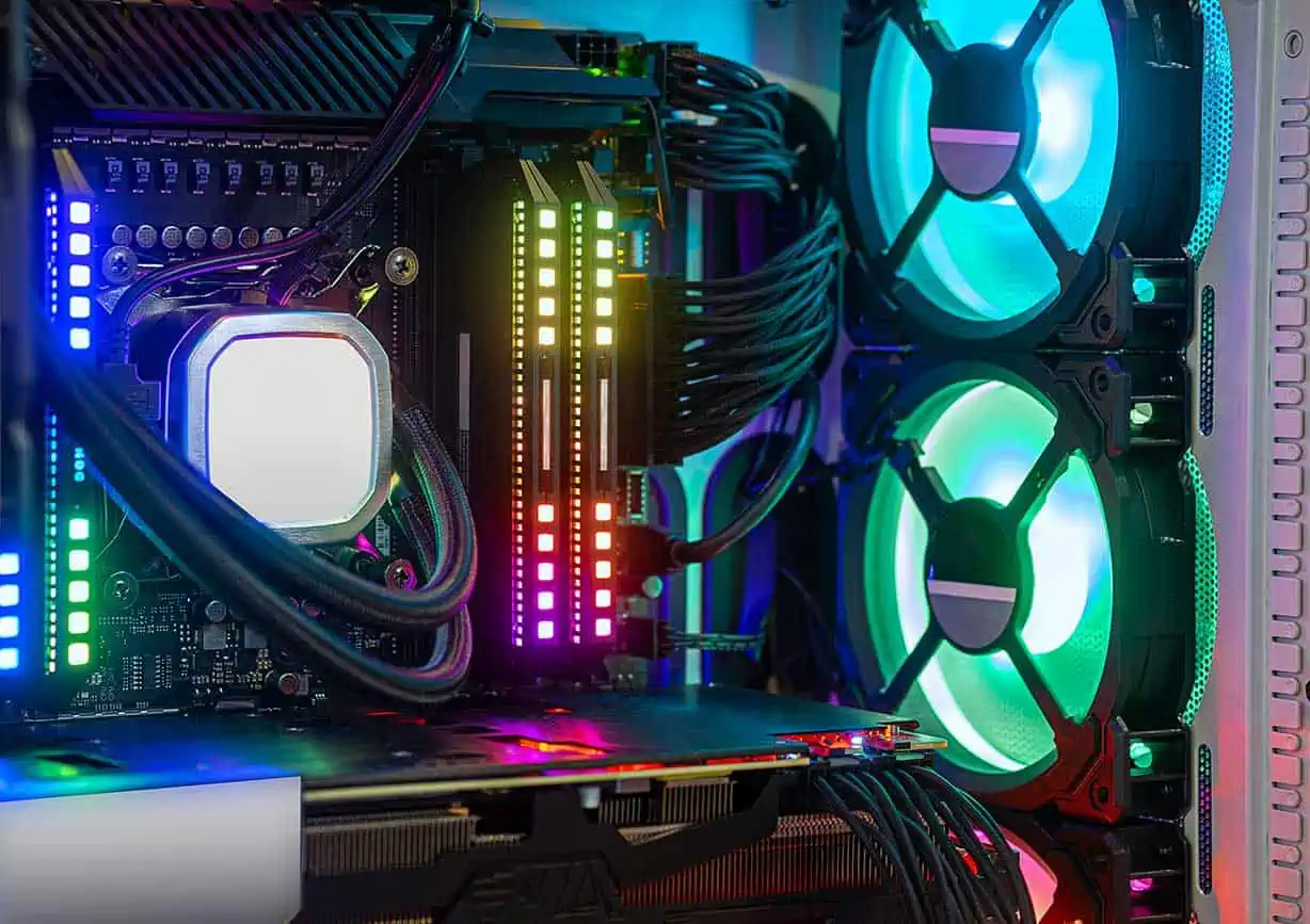 Close Up Of Inside Of A Gaming PC With Multi-Colored LED Lights Inside The Custom PC Case