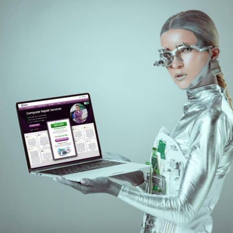 Futuristically dressed woman holding a modern laptop.