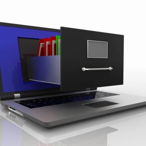 Rendering of a laptop with a file cabinet drawer popping out with folders inside