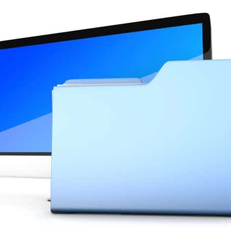 A computer monitor and file folder