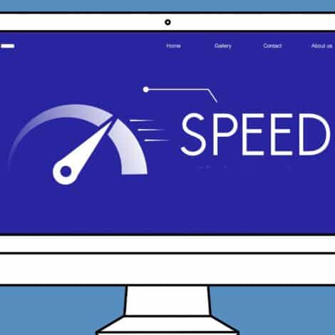 an illustration of a computer with a speed gauge on it pinned at fast