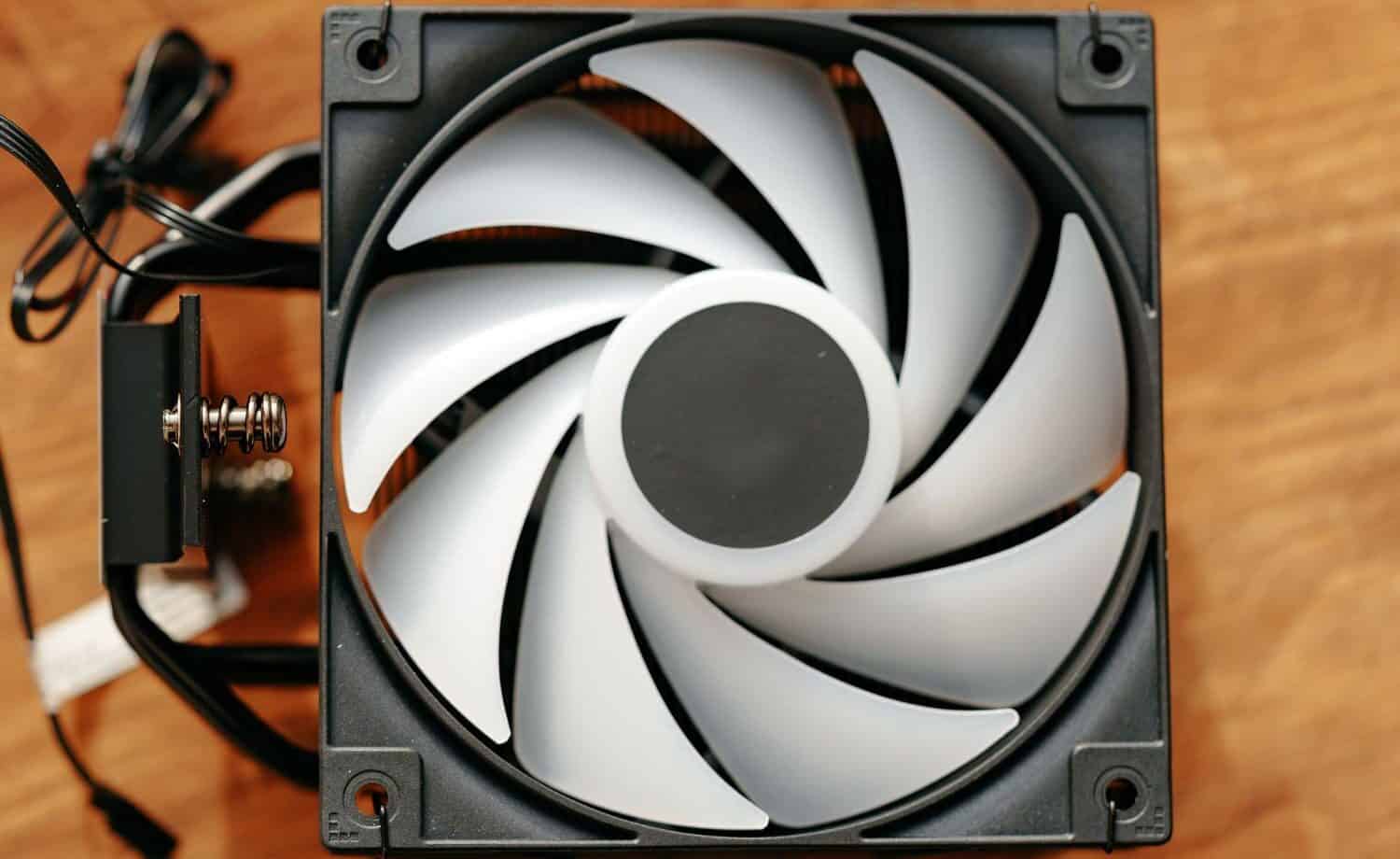 Desktop computer fan on table